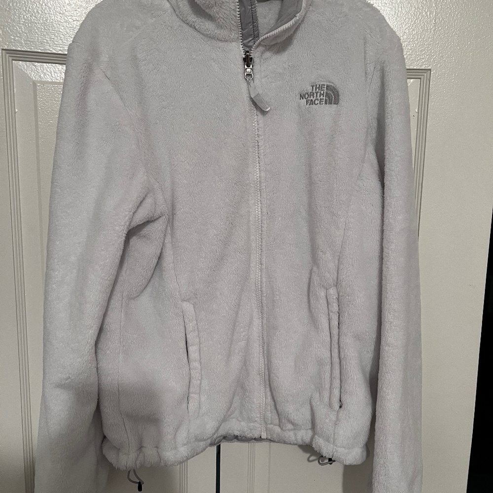 White fluffy North Face jacket